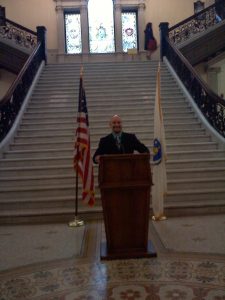 Mookie speaking at the Massachusetts State House